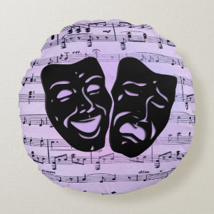 Paarse muziek- en theatermaskers rond kussen