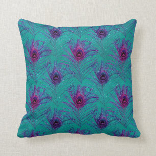 Paarse Peacock Feathers op Blauwgroen Kussen