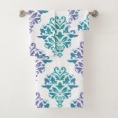 Paarse verloopdampingsset met turquoise bad handdoek (Insitu)