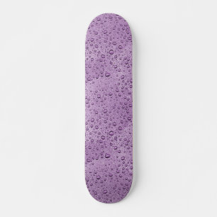 Paarse waterdruppels skateboard