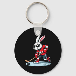 Paashaas speelt ijshockey sleutelhanger
