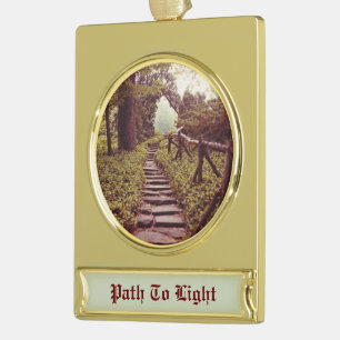 Pad naar licht verguld banner ornament