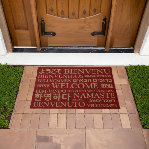 Paillasson Bienvenue dans différentes langues maroon or éléga