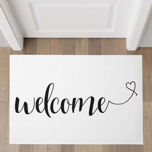 Paillasson Bienvenue de script blanc avec accentuation cardia
