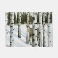 Cerf en chute de neige