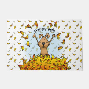 Paillasson Chien Jouant dans un seau de feuilles d'automne -