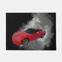 Corvette rouge avec fumée grise arrière - plan amo