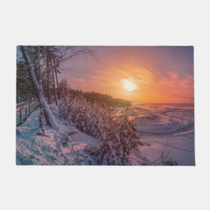 Paillasson Coucher de soleil sur la côte de la mer enneigée