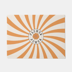 Paillasson Flower Power avec des rayons orange psychédéliques