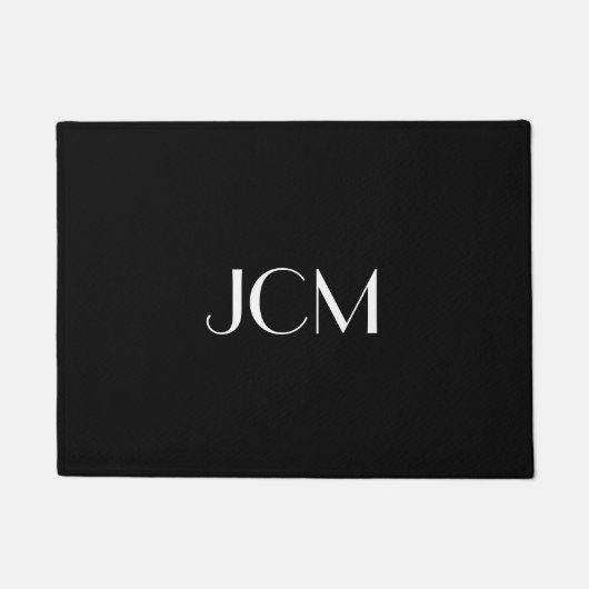 Paillasson Monogramme initial blanc sur fond noir (Devant)