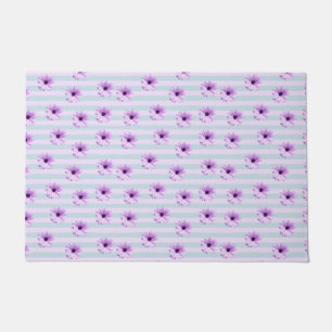 Paillasson motif de marguerite rayée de bleu et de violet