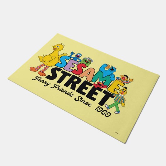 Paillasson Rue Sésame | Furry Friends depuis 1969 (Incliné)