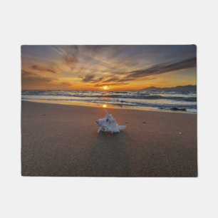 Paillasson Shell à la plage à l'île du coucher du soleil  