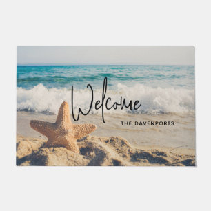 Paillasson Starfish sur une plage de sable Photo