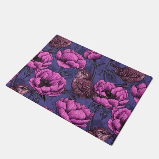 Paillasson Wrens dans le jardin de l'anémone (Incliné)