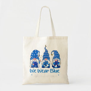 Pak deze "Drie Gnomen Holding Blue Puzzle Autisme" Tote Bag