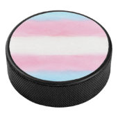 pale trans flag design on hockey puck (3/4)