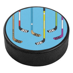 Palet De Hockey Sticks de hockey colorés sur la canette de hockey