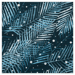 Palmbladeren op blauw met witte poka-stippen. stof