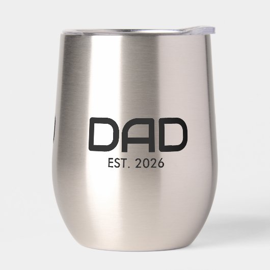 Papa a établi un nouveau cadeau pour papa (Gauche)