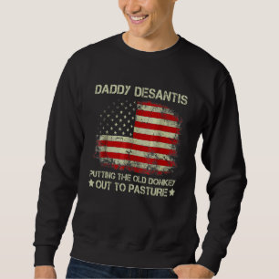 Papa Desantis laat de oude ezel naar het weiland g Trui