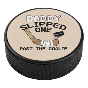 Papa heeft er één uit gehaald. hockey puck