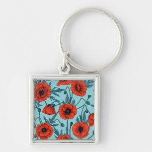 Papavers, rood en blauw op zwembad blauw sleutelhanger