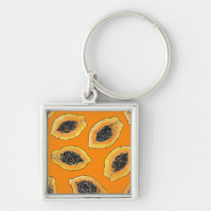 Papaya plakjes op sinaasappel sleutelhanger