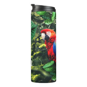 Papegaai scharlaken ara in oerwoud met bloemetjes thermosbeker