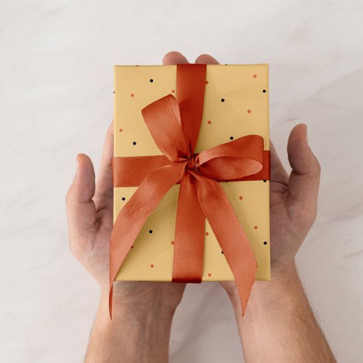 paper con puntos sobre fondo naranja cadeaupapier