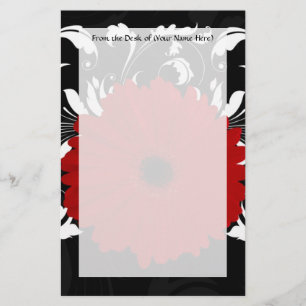 Papeterie Marguerite rouge lumineuse de Gerbera sur le noir