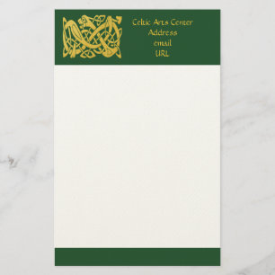 Papeterie Serpent d'or celtique sur un livre vert sombre