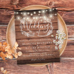 Papier Budget Rustic Bois Chaîne Lumière Faire-part de ma<br><div class="desc">Doté de jolies lampes à cordes et d'une guirlande florale dessinée à la main,  cet élégant faire-part de mariage en bois rustique et économique peut être personnalisé avec vos informations en lettrage chic sur un arrière - plan de panneaux de bois. Conçu par Thisisnotme©</div>