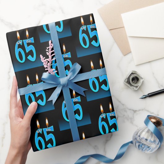 Papier Cadeau 65e anniversaire bougies avec boules d'yeux (Cadeaux)