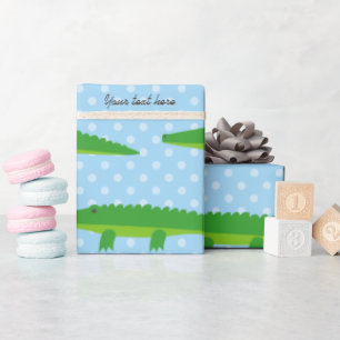 Papier cadeau à pois avec crocodile mignon