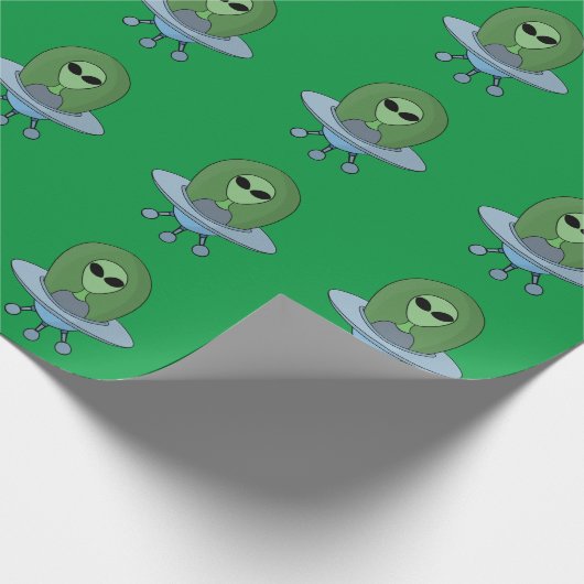 Papier Cadeau Alien dans son petit vaisseau spatial (Coin)