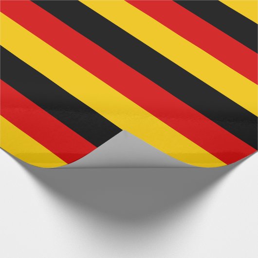 Papier Cadeau Allemagne : bandes dorées rouges noirs (Coin)