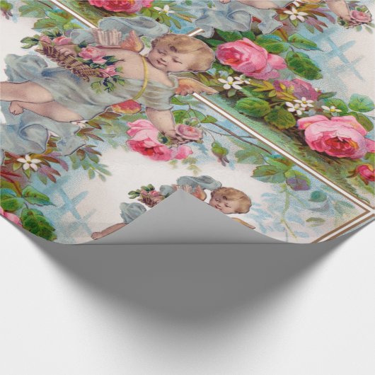 PAPIER CADEAU ANGE ROMANTIQUE RASSEMBLANT ROSES ET FLEURS ROSES  (Coin)
