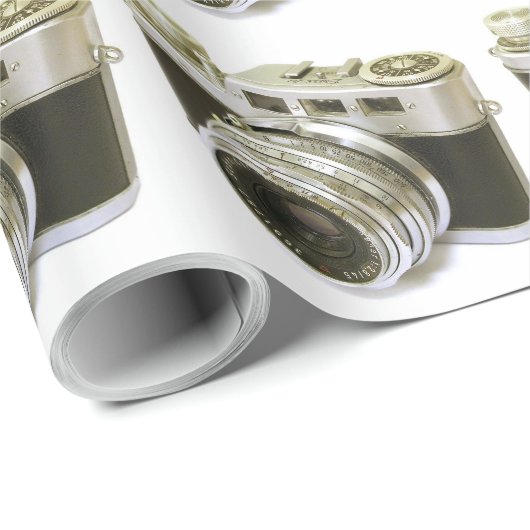 PAPIER CADEAU APPAREIL PHOTO RETRO MOTIF (Coin rond)