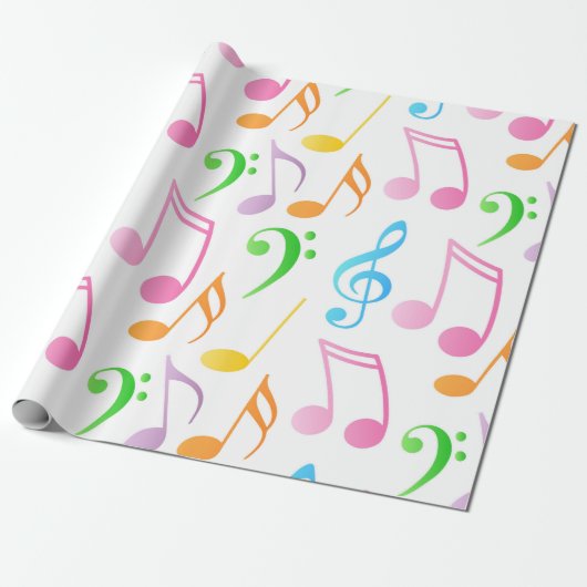 Papier Cadeau Arc-en-ciel - Notes musicales enveloppant du papie (Déroulé)