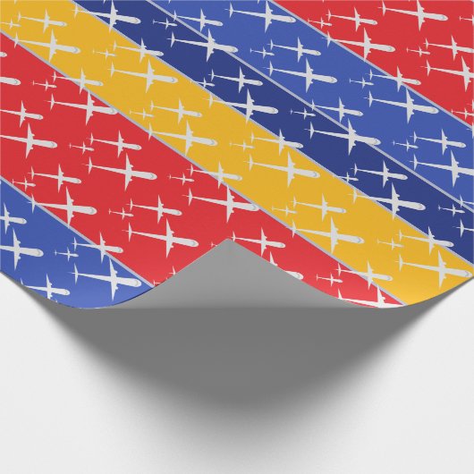 Papier Cadeau Avions volent en formation rouge bleu et jaune (Coin)