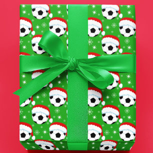 Papier Cadeau Ballon de football portant le chapeau du Père Noël