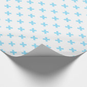 Papier Cadeau Bébé bleu croix coutures sur blanc (Coin)