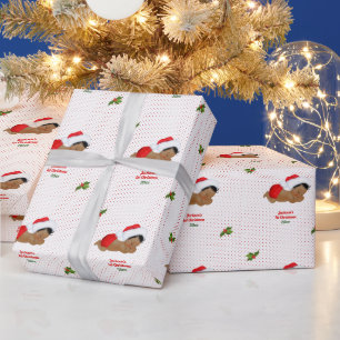 Papier cadeau bébé chapeau de Père Noël rouge Noël