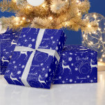 Papier Cadeau Blue Christmas Reindeer Wonder<br><div class="desc">Cet élégant papier d'emballage de vacances présente un renne blanc silhoué,  des flocons de neige blancs et un joli design tourbillon argenté sur un arrière - plan de nuit bleu foncé. Le texte en blanc dit "La Merveille de Noël". Belle,  festive et unique !</div>
