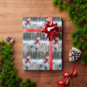 Papier Cadeau Bonhomme de neige de Noël patinant avec un chien