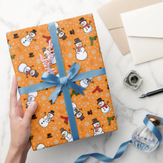 Papier Cadeau Bonhommes de neige et flocons de neige sur orange