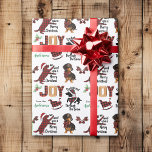 Papier Cadeau Buffalo Plaid Dachshund Chien Christmas Joie<br><div class="desc">Ce joli papier d'emballage Holiday est parfait pour l'Amoureux des chiens Dachshund! Il présente plusieurs images de petits Dachshunds, avec un thème plaid de buffle rouge et noir. Le texte dit "Nous vous offrons un joyeux Noël", JOY, "Dachshund à travers la neige", et votre propre signature personnalisée. Il y a...</div>