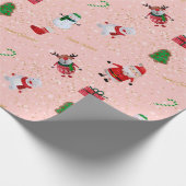Papier Cadeau Caractère de Noël sur le rose et les parties (Coin)