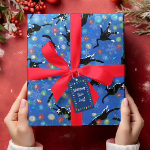 Papier Cadeau Chat amusant pris en étau dans les lumières de Noë